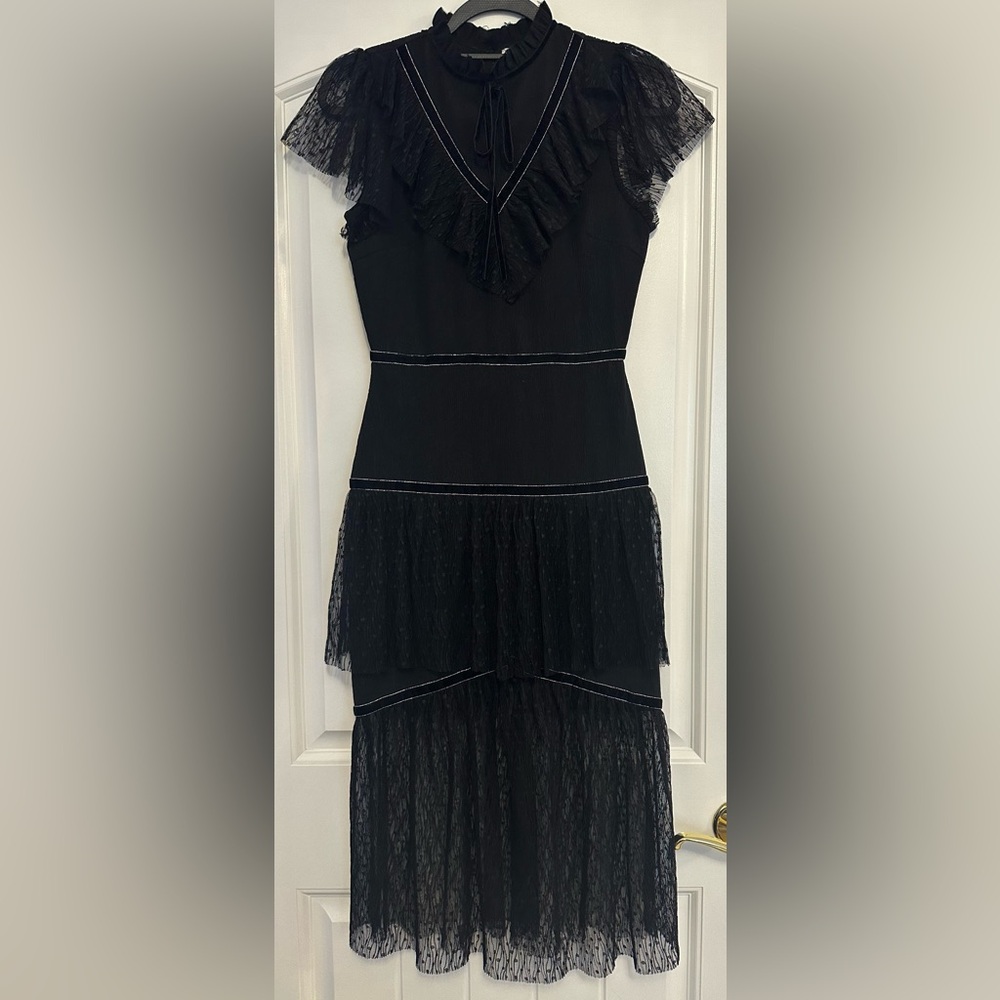 JUST ONE ANSWER black layered dress with tulle ruffles.